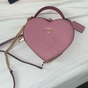 Bag has never been worn. Asking for 80$ bag was purchased for 129.00